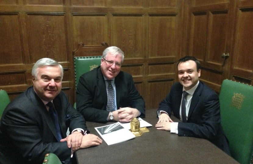 Oliver with the Transport Secretary (centre) and Stephen McPartland MP (right)