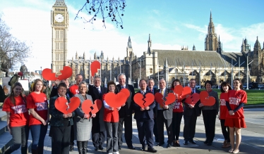 Sir Oliver pictured outside Parliament with other MPs and BHF staff