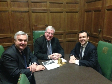 Oliver with the Transport Secretary (centre) and Stephen McPartland MP (right)